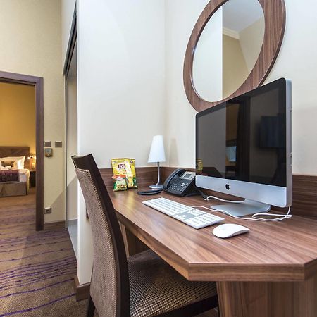 Merchants Crown Suites And Spa Prague Exterior photo A computer in a hotel room