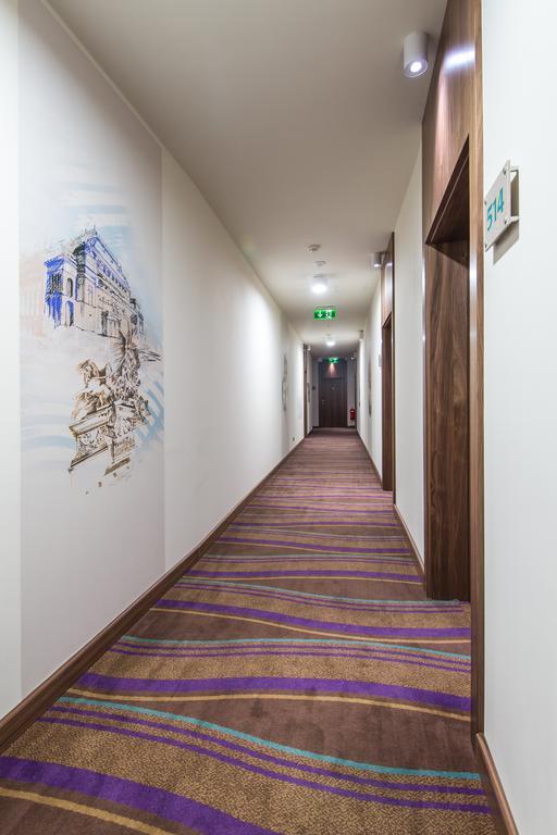 Merchants Crown Suites And Spa Prague Exterior photo A typical hotel corridor